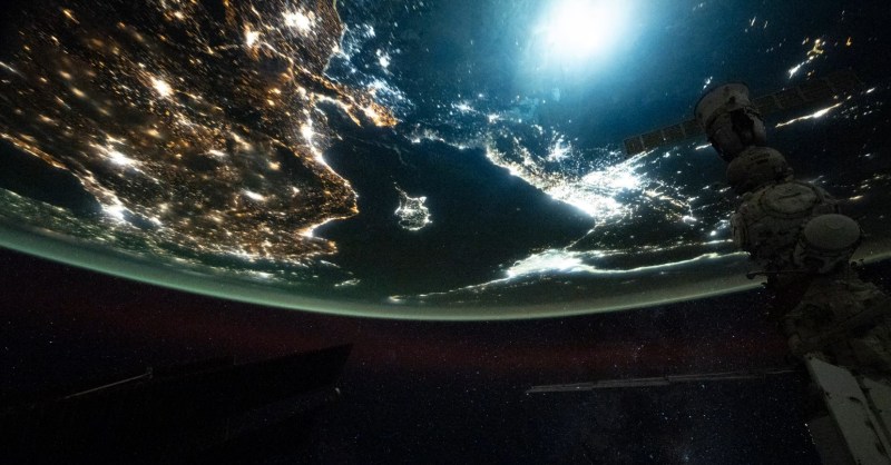 Astronaut captures a meteor exploding in the atmosphere over Earth